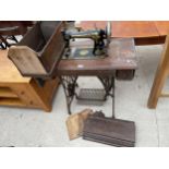 A SINGER TREADLE SEWING MACHINE