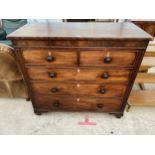 A 19TH CENTURY MAHOGANY CHEST OF TWO SHORT AND THREE LONG DRAWERS AND A SECRET DRAWER TO FRIEZE