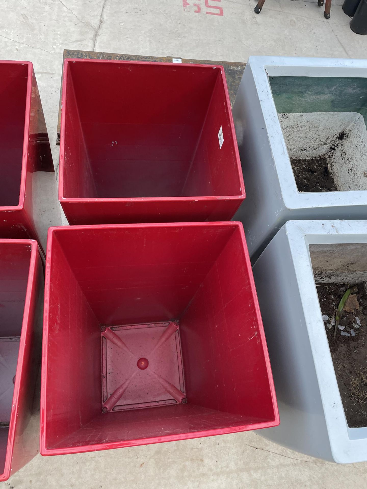 A PAIR OF RED FIBRE GLASS PLANTERS (H:75CM) - Image 2 of 2