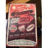 A TIN CAR SALES SIGN