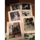 SIX MOUNTED PICTURES OF MOVIE STILLS TO INCLUDE ELIZABETH TAYLOR, GENE KELLY, DORIS DAY, NORMAN