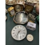 A QUANTITY OF CLOCKS TO INCLUDE ALARM CLOCKS, WALL CLOCK , MANTLE CLOCKS ETC