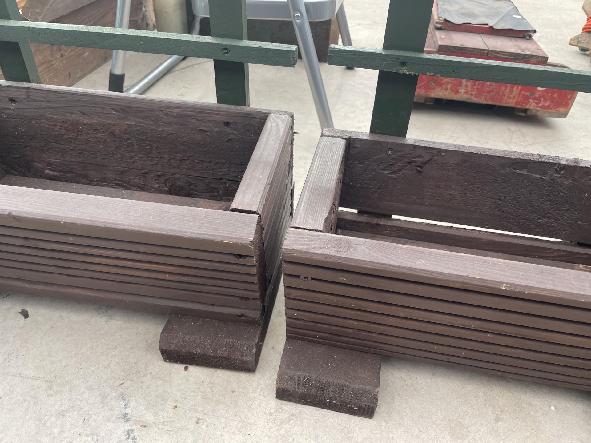 A PAIR OF PAINTED WOODEN PLANTER TROUGHS - Image 2 of 2