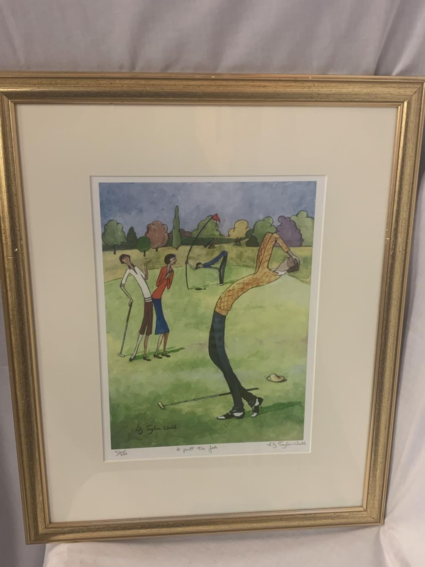 A GILT FRAMED LIMITED EDITION LIZ TAYLOR WEBB PICTURE 'A PUTT TO FAR' PENCIL SIGNED TO LOWER RIGHT