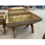 A LARGE WOODEN TROUGH PLANTER (120CM X 84CM X 79CM)