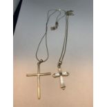 TWO MARKED 925 SILVER NECKLACES BOTH WITH CROSS PENDANTS ONE WITH A PEARLISED DESIGN