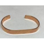 A COPPER BANGLE