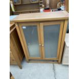 A MODERN TWO DOOR GLAZED CABINET