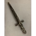 A WHITE METAL DAGGER IN A CASE