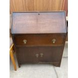 AN EARLY 20TH CENTURY OAK BUREAU 29" WIDE