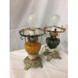 TWO BRASS LAMPS CONVERTED TO ELECTRIC IN AMBER AND GREEN