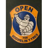 A CAST SIGN 'OPEN FOR MICHELIN TYRES'