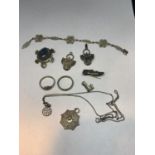 TEN ITEMS OF MAINLY SILVER TO INCLUDE A BRACELET, RINGS, BROOCHES, SPIDERS WEB PENDANT ETC