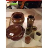 A SELECTION OF EARTHENWARE POTS, SOME WITH LIDS