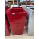 A PAIR OF RED FIBRE GLASS PLANTERS (H:75CM)