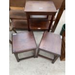 AN OAK TWO TIER CENTRE TABLE AND A PAIR OF OAK STOOLS