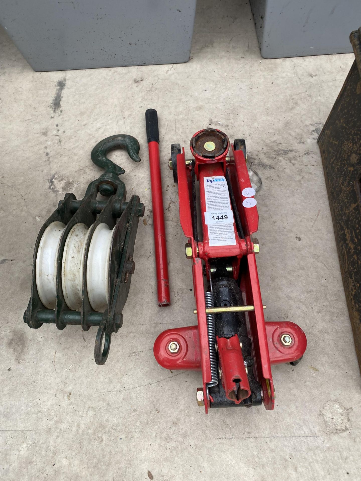 A WINCH PULLEY BRACKET WITH HOOK AND A TROLLEY JACK