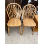 A PAIR OF WINDSOR STYLE WHEEL-BACK CHAIRS