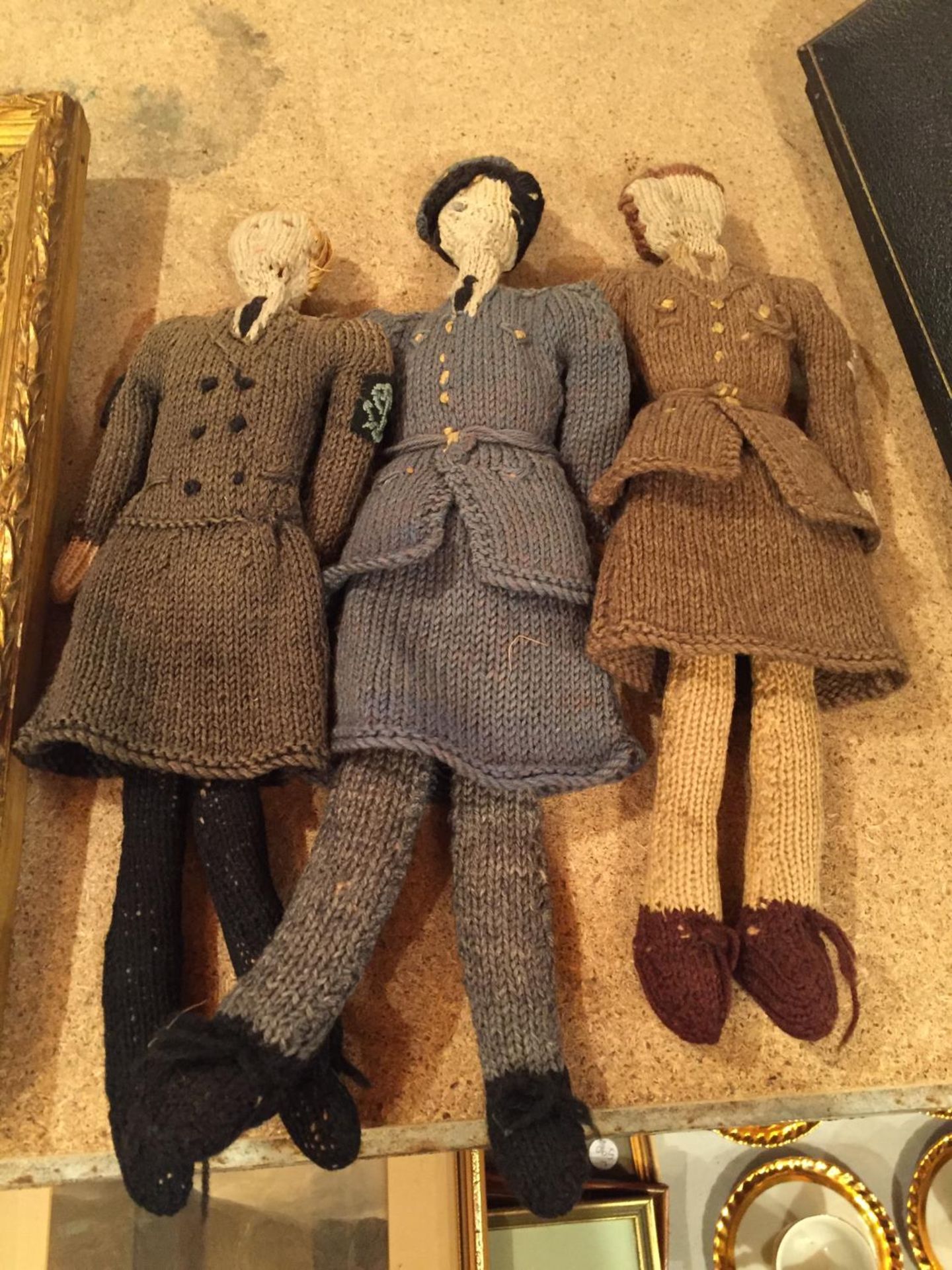 THREE HANDKNITTED WAR DOLLS IN THE GUISE OF A WREN, A WRAF AND AN ARMY LADY