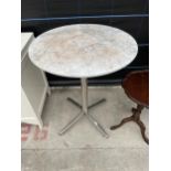 A MARBLE TOP TABLE ON POLISHED CHROME BASE 23.5" DIA