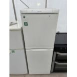 A WHITE ELECTROLUX UPRIGHT FRIDGE FREEZER