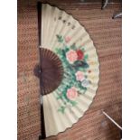 A VERY LARGE DECORATIVE FAN SIZE 92CM LONG