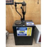 A VINTAGE MANUAL PUMP OIL DISPENSER