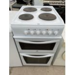 A WHITE INDESIT FREE STANDING OVEN AND HOB