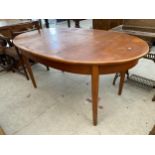 A RETRO OVAL TEAK DINING TABLE - 60" X 30" WITH EXTRA LEAF 18"