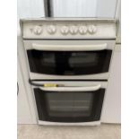 A WHITE CANNON FREESTANDING OVEN AND HOB