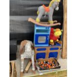 AN ASSORTMENT OF CHILDRENS TOYS TO INCLUDE TWO ROCKING HORSES AND A WOODEN KITCHEN ETC