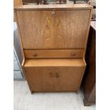 A RETRO TEAK BUREAU BY REMPLOY 24" WIDE