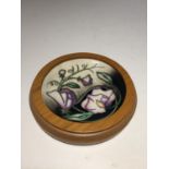 A FRAMED MOORCROFT PIN DISH TRIAL PIECE