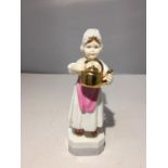 A ROYAL WORCESTER FIGURE 'POLLY PUT THE KETTLE ON'