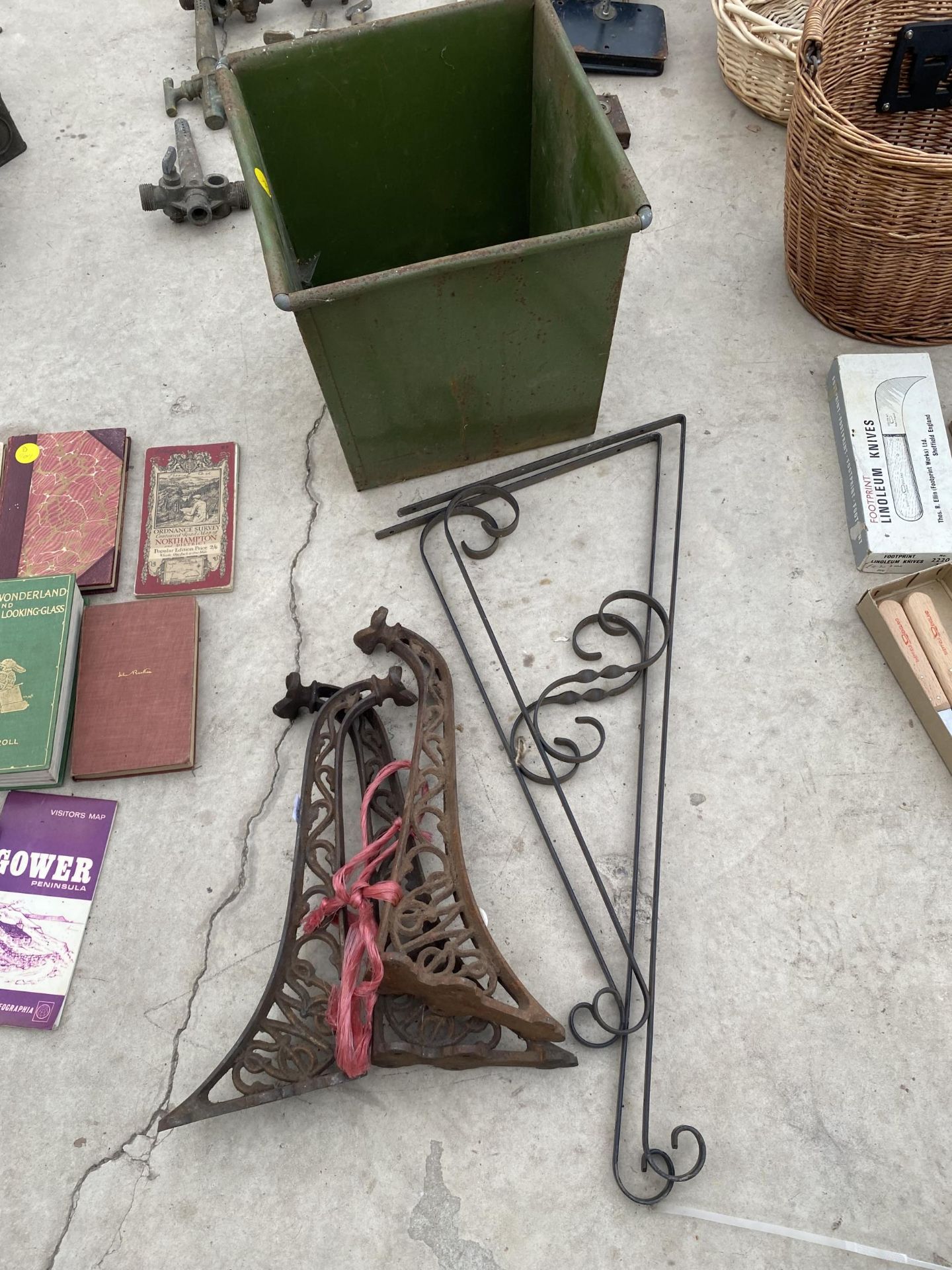 AN ASSORTMENT OF ITEMS TO INCLUDE A WASTE PAPER BIN, HANGING BASKET BRACKETS AND CAST SINK BRACKETS