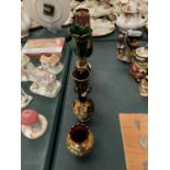FOUR PIECES OF COLOURED BOHEMIAN GLASS WITH FLORAL DECORATION