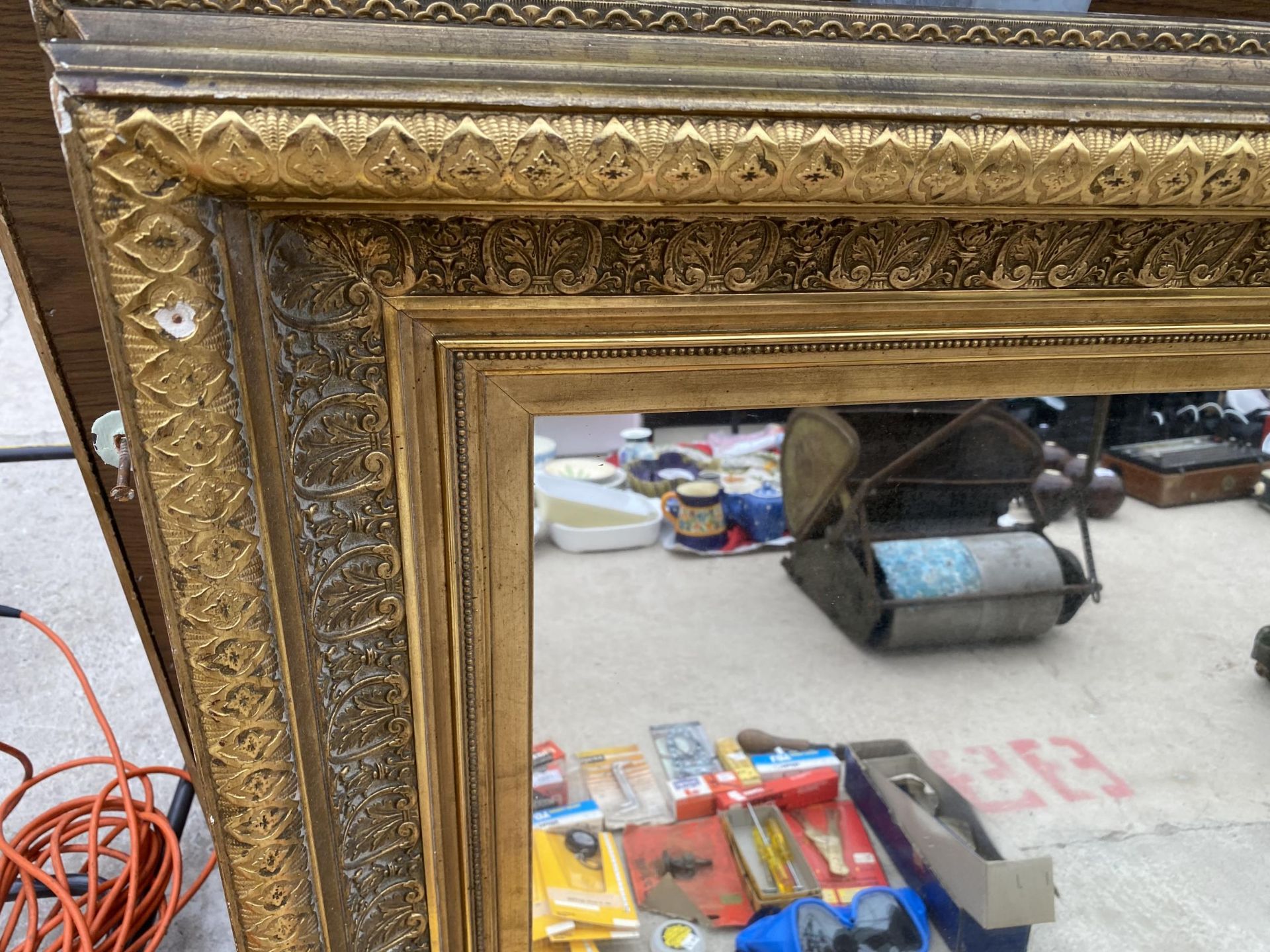 A 19TH CENTURY STYLE GILT FRAMED WALL MIRROR BEARING THE LABEL TO THE BACK 'IN INVENTORY FROM - Image 2 of 3