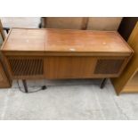 AN ULTRA RADIOGRAM IN A RETRO TEAK CABINET