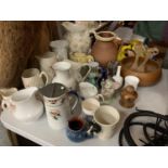 AN ASSORTMENT OF CERAMICS TO INCLUDE VASES, JUGS, A WOODEN SALAD BOWL AND SERVERS, ETC
