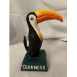 A CAST IRON GUINNESS ORNAMENT/DOORSTOP HEIGHT 20CM