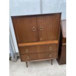 A RETRO TEAK TALLBOY BY REMPLOY 33" WIDE