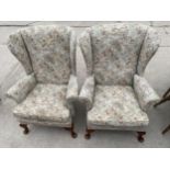 A PAIR OF WINGED PARKER KNOLL FIRESIDE CHAIRS ON FRONT CABRIOLE LEGS MODEL PK 720 MK3