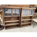 A PAIR OF OPEN WALL SHELVES WITH GLAZED AND LEADED DOORS TO THE TOP SECTION 32" WIDE