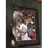 A FRAMED SIGNED PICTURE OF GREG RUDESKI WITH CERTIFICATE OF AUTHENTICITY