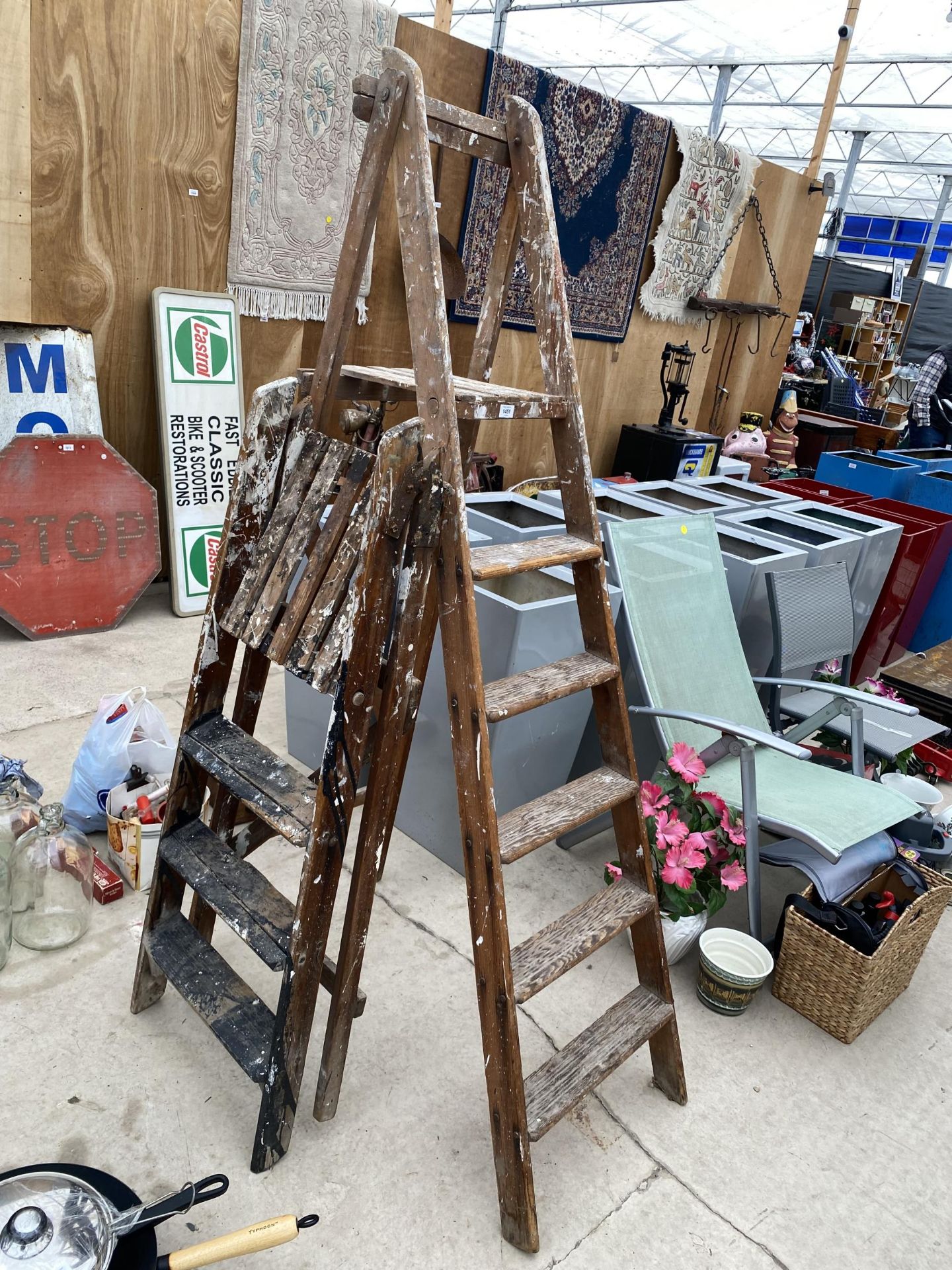 A VINTAGE WOODEN FIVE RUNG STEP LADDER AND A FURTHER THREE RUNG WOODEN STEP LADDER