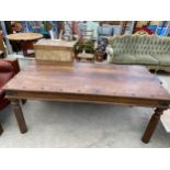 AN INDIAN STUDDED HARDWOOD DINING TABLE ON TURNED SUPPORTS - 73" X 30"