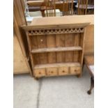 A VICTORIAN STYLE PINE WALL SHELF WITH FOUR DRAWERS