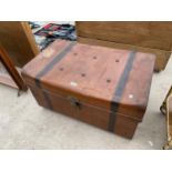 A VINTAGE METAL STORAGE TRUNK WITH TWO HANDLES AND CLASP