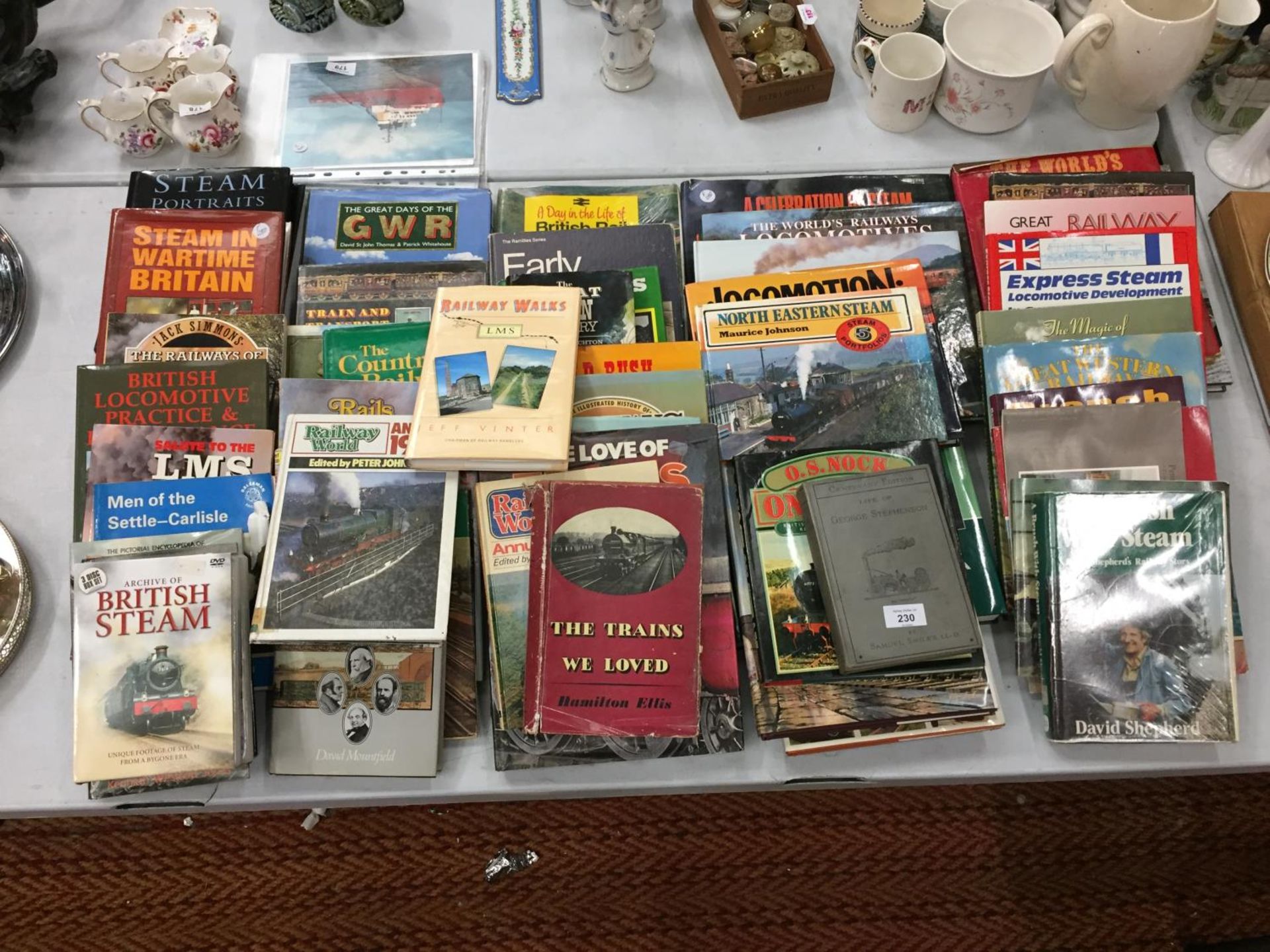 AN EXTREMELY LARGE COLLECTION OF STEAM ENGINE BOOKS AND FURTHER RAILWAY PARAPHERNALIA