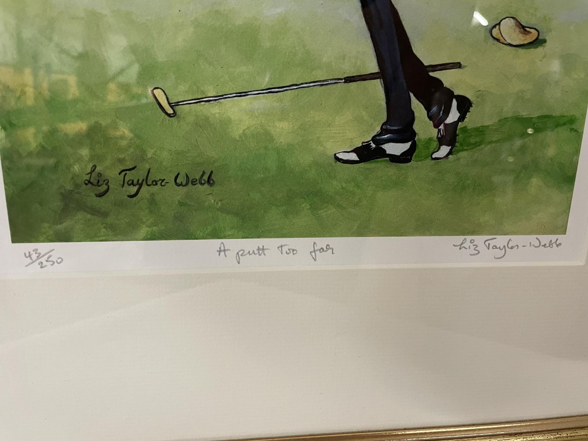 A GILT FRAMED LIMITED EDITION LIZ TAYLOR WEBB PICTURE 'A PUTT TOO FAR' PENCIL SIGNED TO LOWER - Image 2 of 2